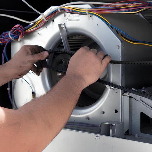 working on an AC blower