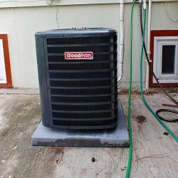 ac compressor outside of a home