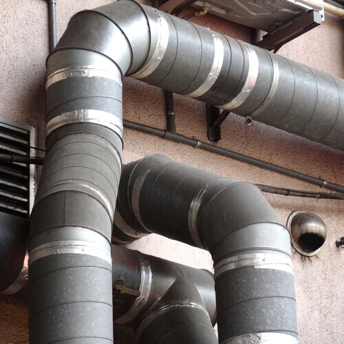 air ducts against a wall