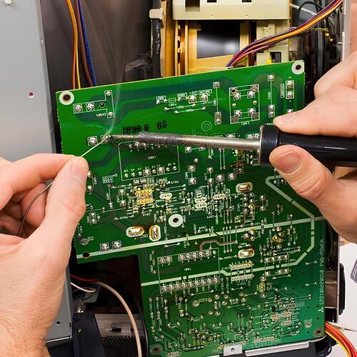 work being done on a circuit control board