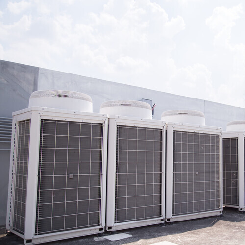 row of AC compressors