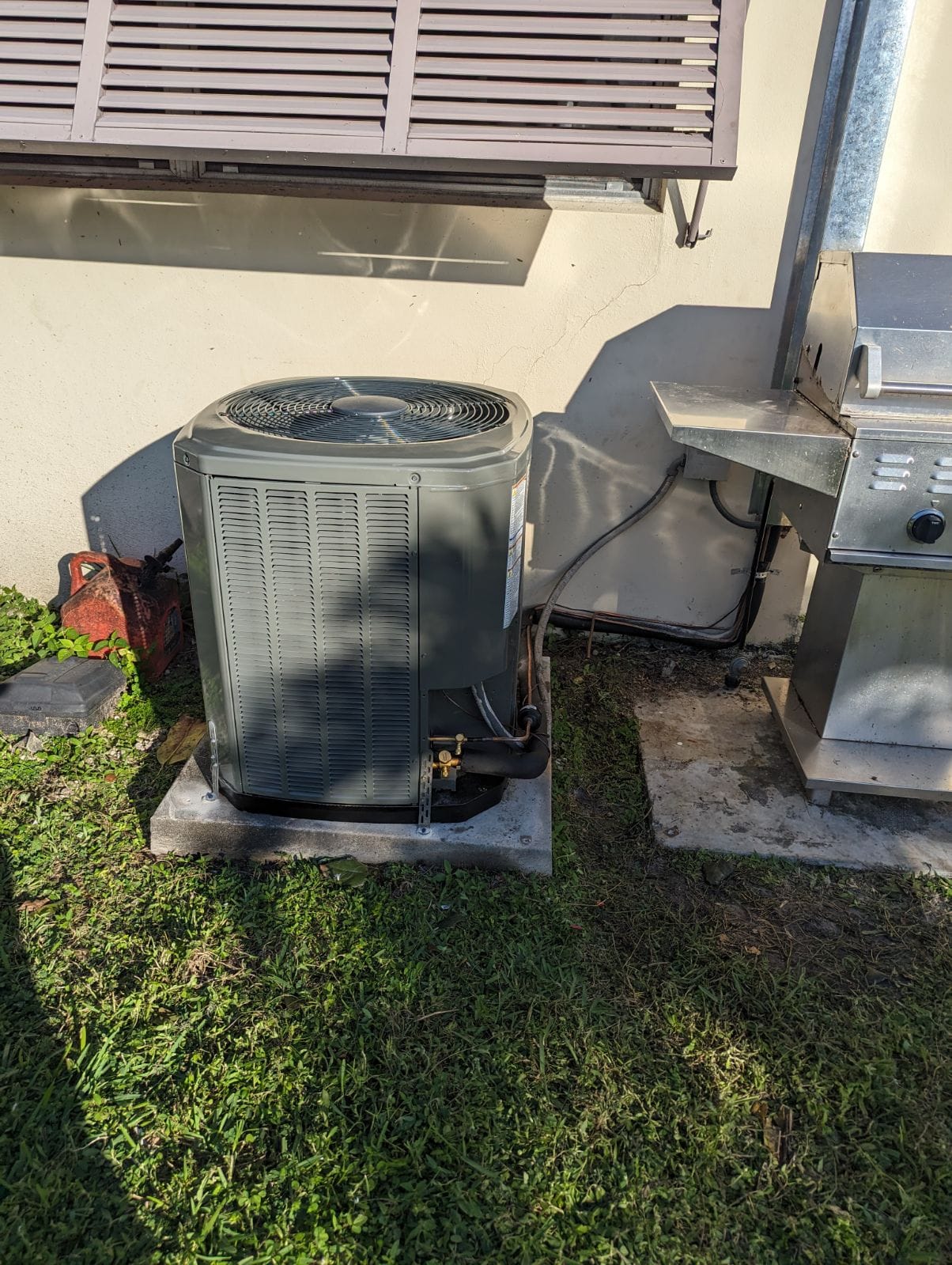 Heat Pump next to Grill